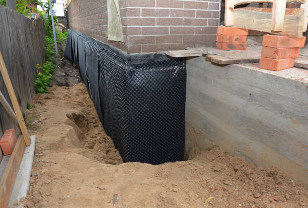 Happy homeowners after waterproofing job in Cedarhurst